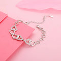 Interlocked Heart Duo Bracelet in Silver Finish